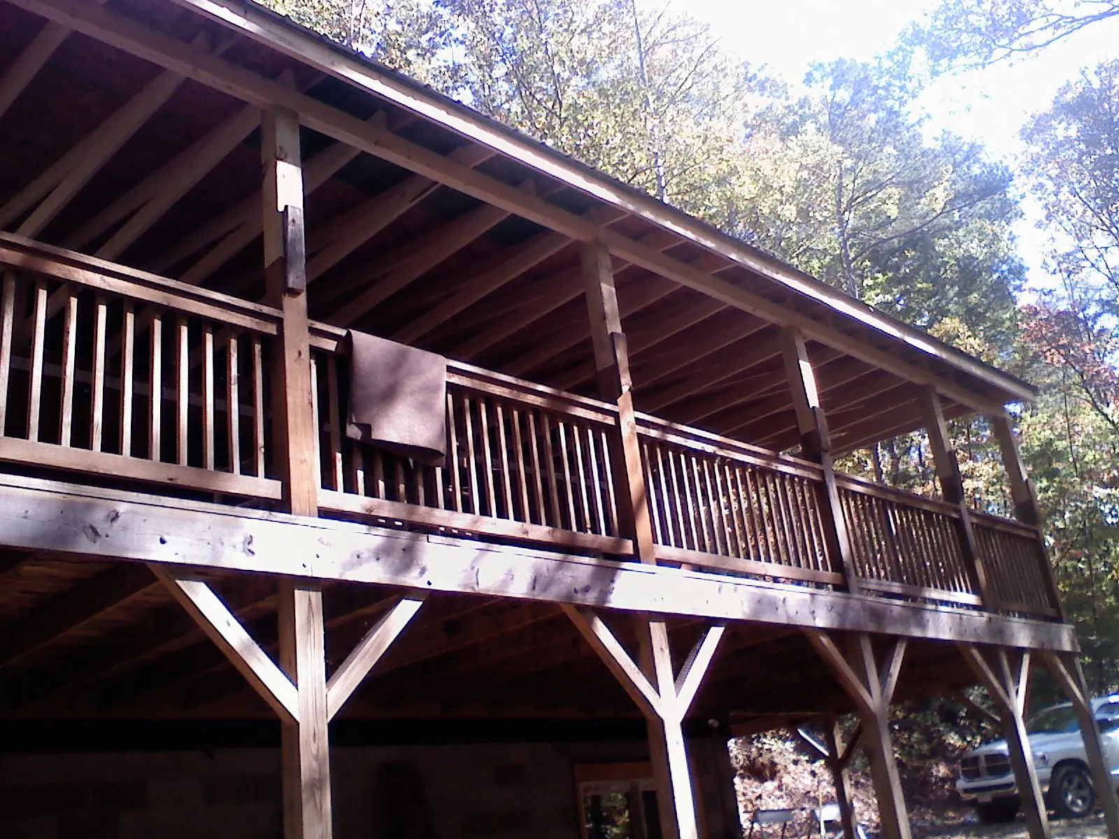 Timber framing under a new elevated porch and deck — Roof Leak Repair in Vandalia by Roofing Brothers